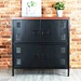 black metal storage cabinet with doors